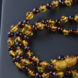 Teething necklace with two color beads